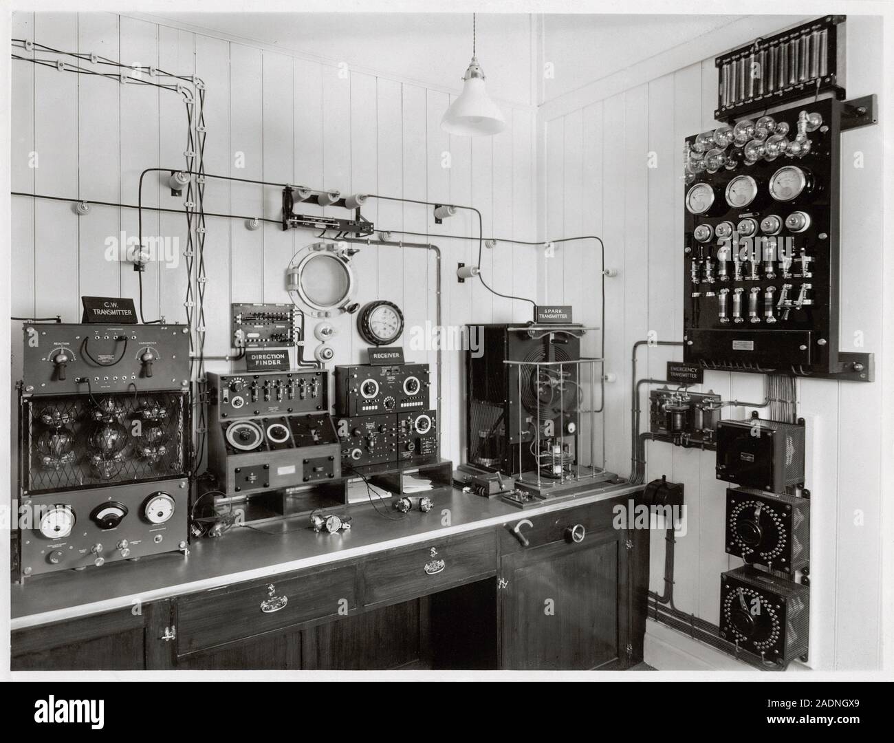 Marconi radio equipment on a ship. The equipment includes headphones
