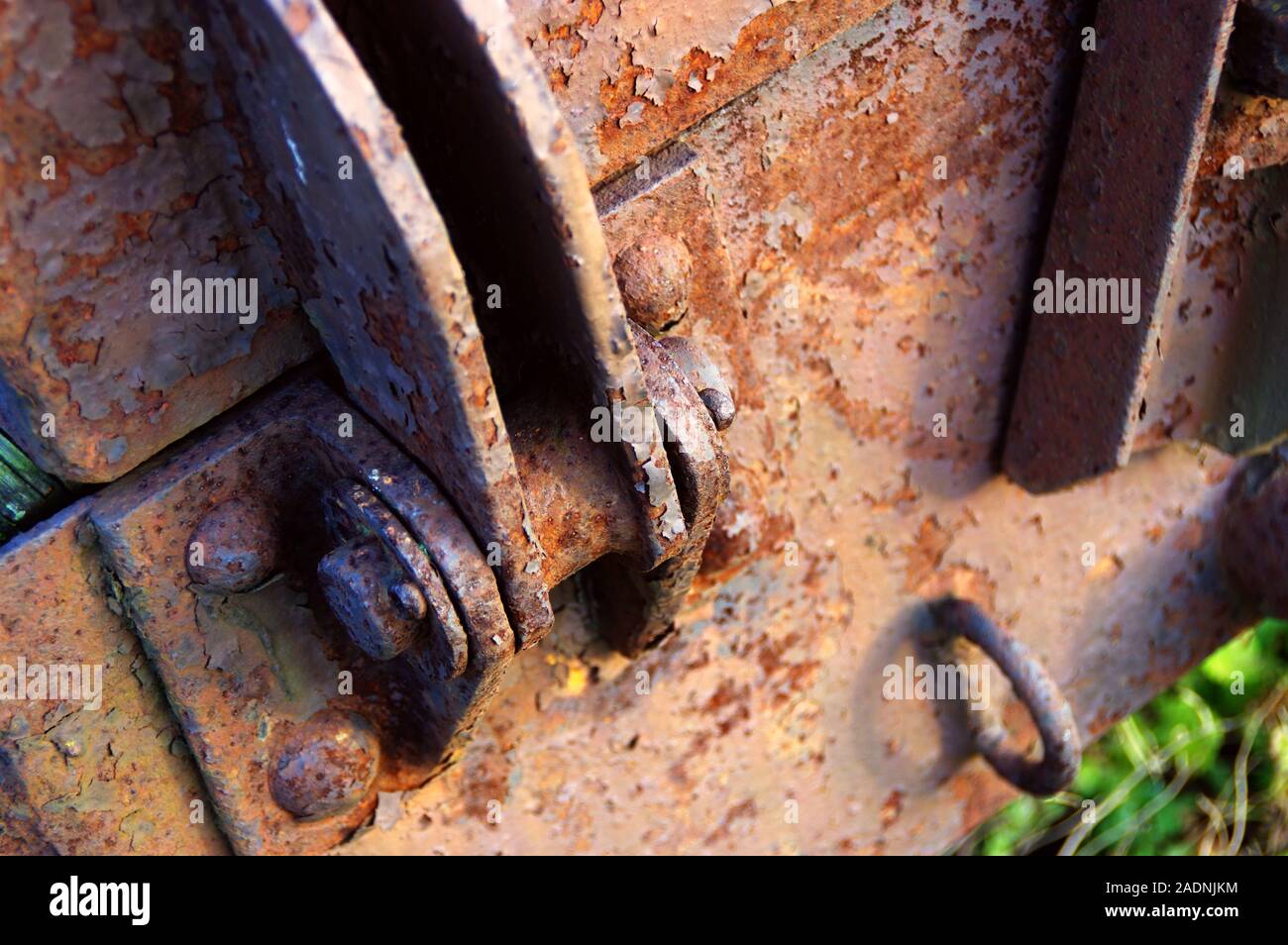 Old rusty link. Damaged and rough hinge mechanism. Stock Photo