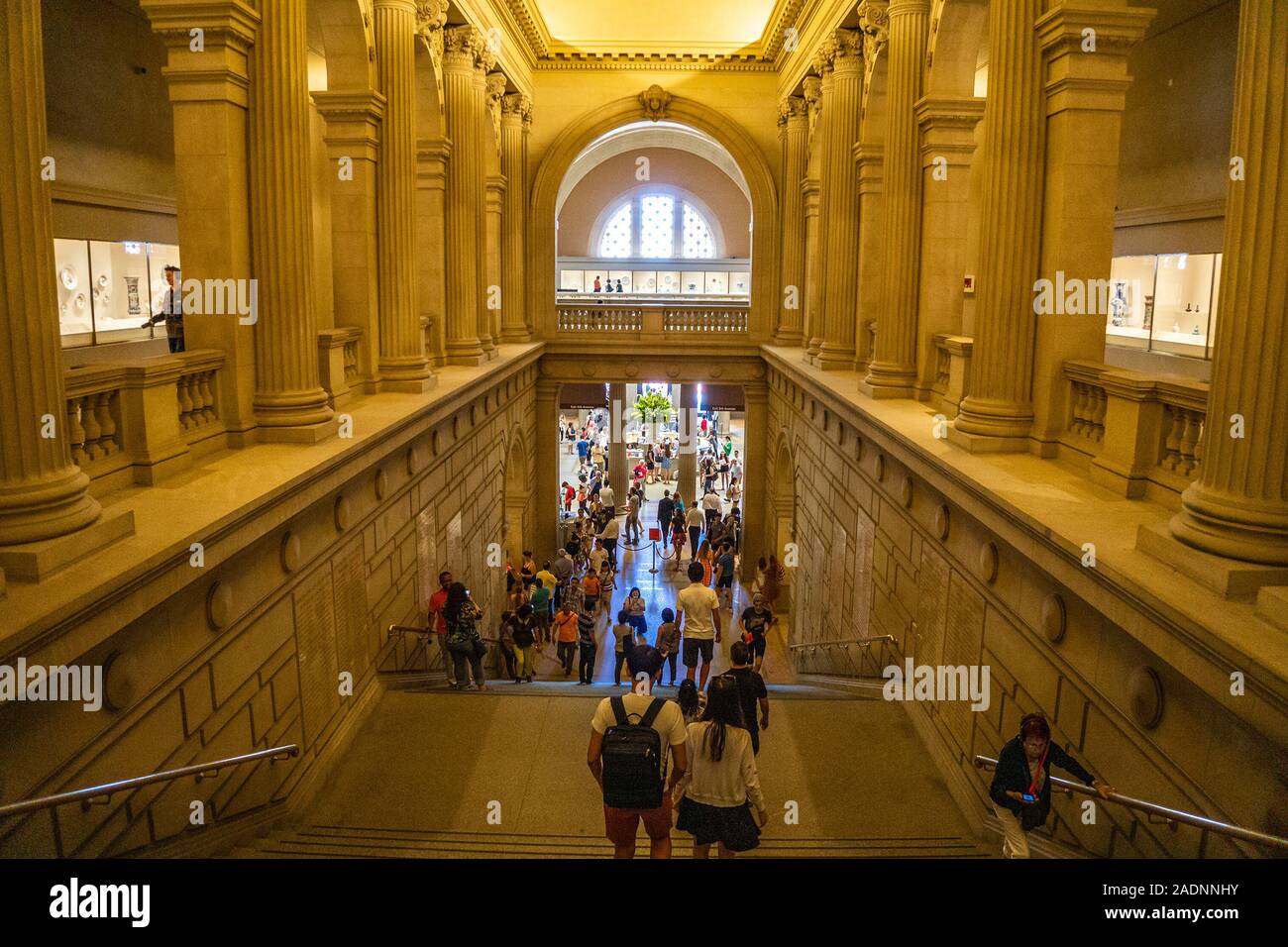 Lot of people and Tourists walk inside the Metropolitan Museum of Art, the largest art museum in