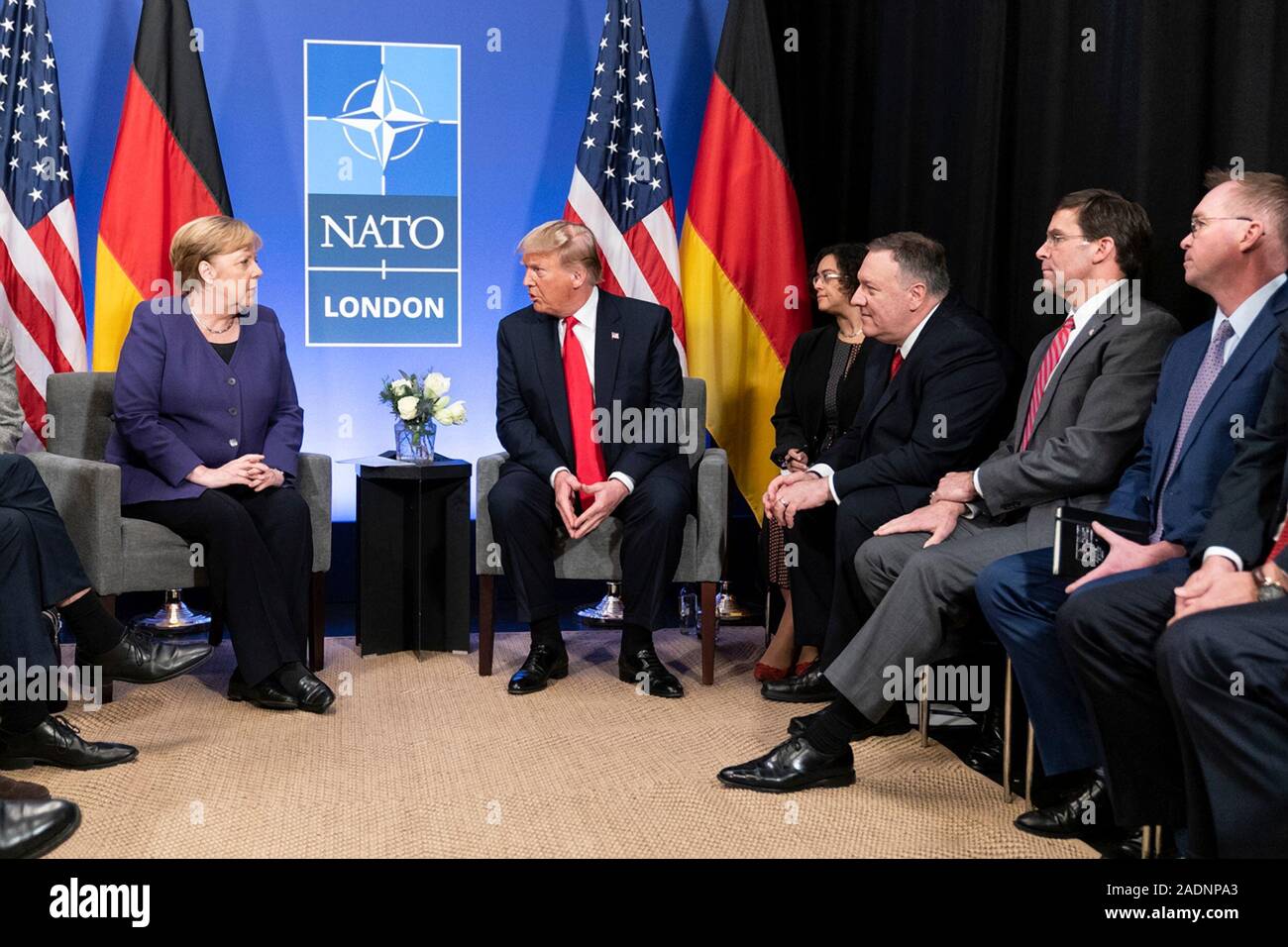 Watford, United Kingdom. 04 December, 2019. U.S. President Donald Trump and German Chancellor Angela Merkel hold a bilateral meeting on the sidelines of the NATO Summit December 4, 2019 in Watford, Hertfordshire, United Kingdom. Joining the president are Secretary of State Mike Pompeo, Secretary of Defense Mark Esper and Chief of Staff Mick Mulvaney.   Credit: Shealah Craighead/Planetpix/Alamy Live News Stock Photo