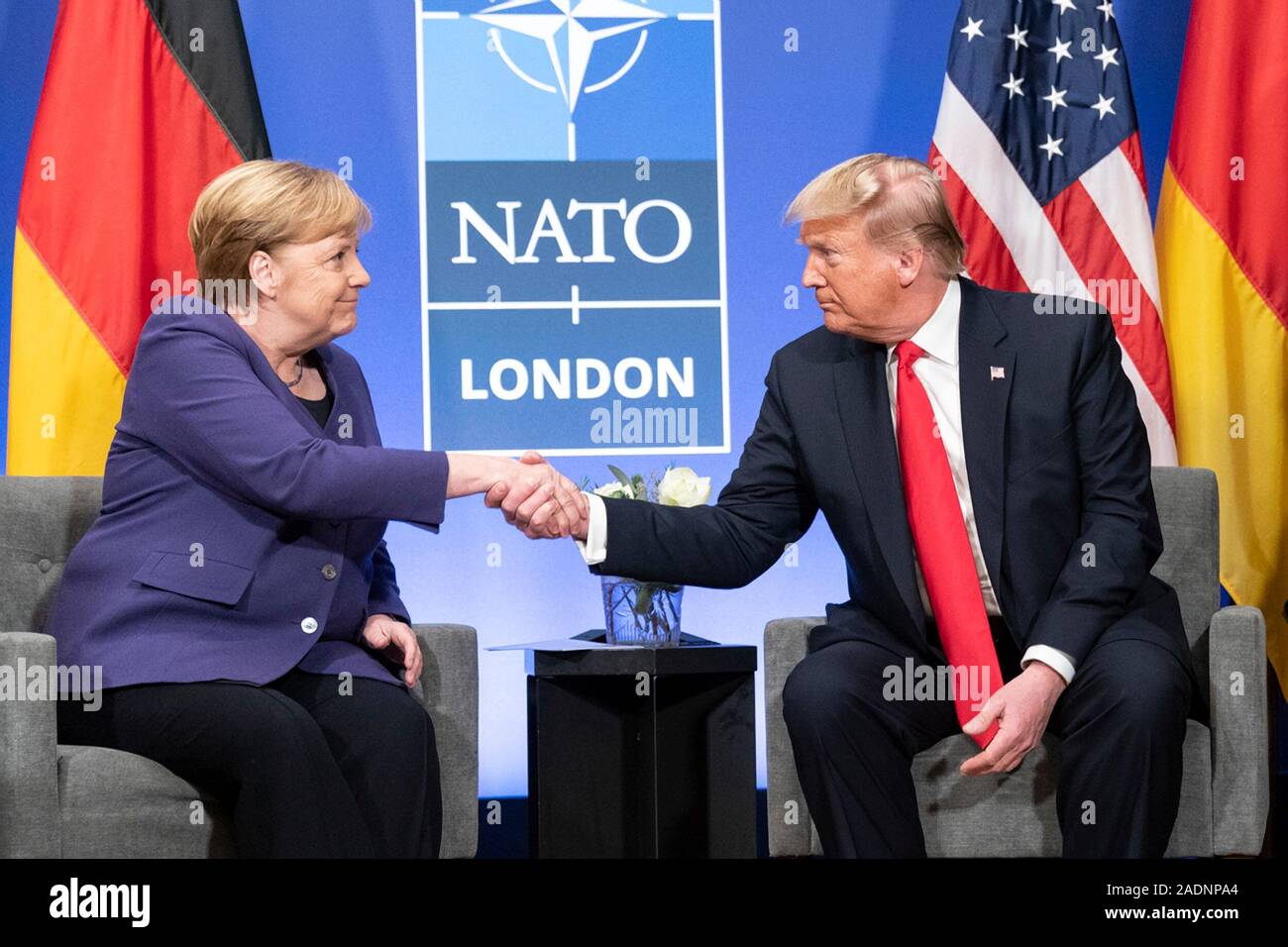 Watford, United Kingdom. 04 December, 2019. U.S. President Donald Trump and German Chancellor Angela Merkel hold a bilateral meeting on the sidelines of the NATO Summit December 4, 2019 in Watford, Hertfordshire, United Kingdom.   Credit: Shealah Craighead/Planetpix/Alamy Live News Stock Photo