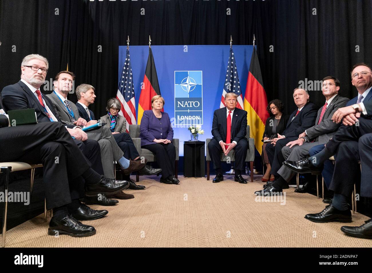 Watford, United Kingdom. 04 December, 2019. U.S. President Donald Trump and German Chancellor Angela Merkel hold a bilateral meeting on the sidelines of the NATO Summit December 4, 2019 in Watford, Hertfordshire, United Kingdom.   Credit: Shealah Craighead/Planetpix/Alamy Live News Stock Photo
