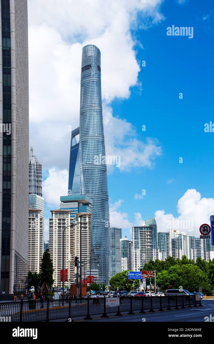 Shanghai, China - August 8, 2019: Shanghai Tower rising above modern downtown area with skyscrapers at day time in Chinese metropolis Stock Photo