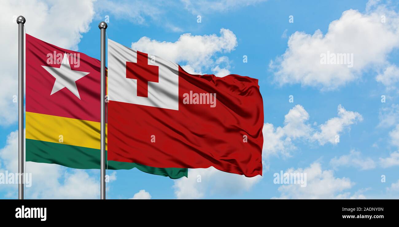 Togo and Tonga flag waving in the wind against white cloudy blue sky  together. Diplomacy concept, international relations Stock Photo - Alamy