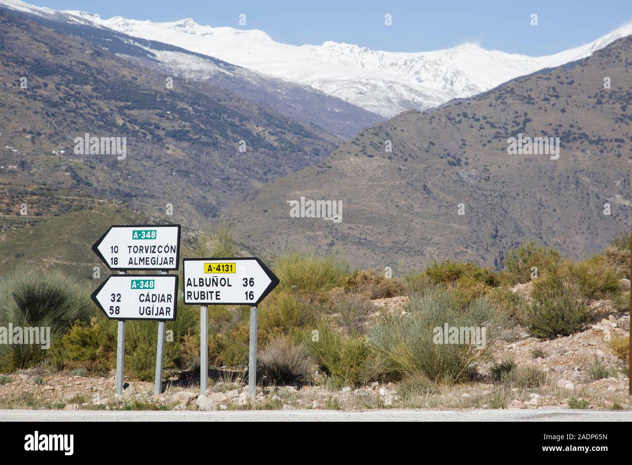 Road signs on the scenic A-348 road through the Alpujarra Valley between Órgiva and Torvizcón, Andalusia, Spain. Stock Photo