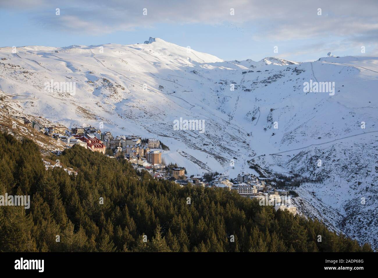 Pradollano village and Sierra Nevada ski area below the peak of Veleta in the Sierra Nevada mountains, Granada, Andalusia, Spain Stock Photo
