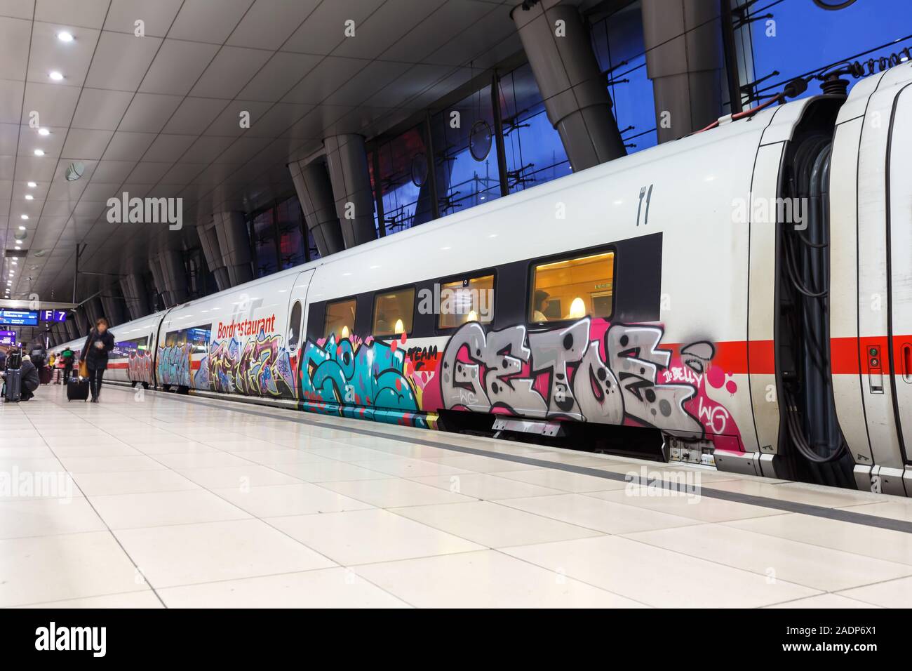 Frankfurt, Germany – November 20, 2019: ICE train with graffiti at Frankfurt airport railway station (FRA) in Germany. Stock Photo