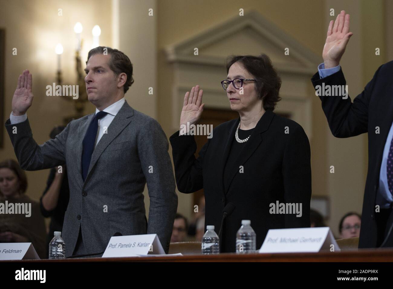 Washington, District of Columbia, USA. 4th Dec, 2019. Constitutional law experts Noah Feldman, of Harvard University, Pamela Karlan, of Stanford University, Michael Gerhardt, of the University of North Carolina, and Jonathan Turley of The George Washington University Law School, are sworn in before the United States House Committee on the Judiciary on Capitol Hill in Washington, DC, U.S. on Wednesday, December 4, 2019. Credit: Stefani Reynolds/CNP/ZUMA Wire/Alamy Live News Stock Photo