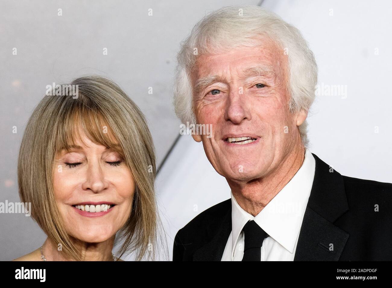 ODEON LUXE Leicester Square, London, UK. 4 December 2019.  Isabella James Purefoy Ellis and Roger Deakins poses at The World Premiere of 1917 and Royal Film Performance. . Picture by Julie Edwards./Alamy Live News Stock Photo