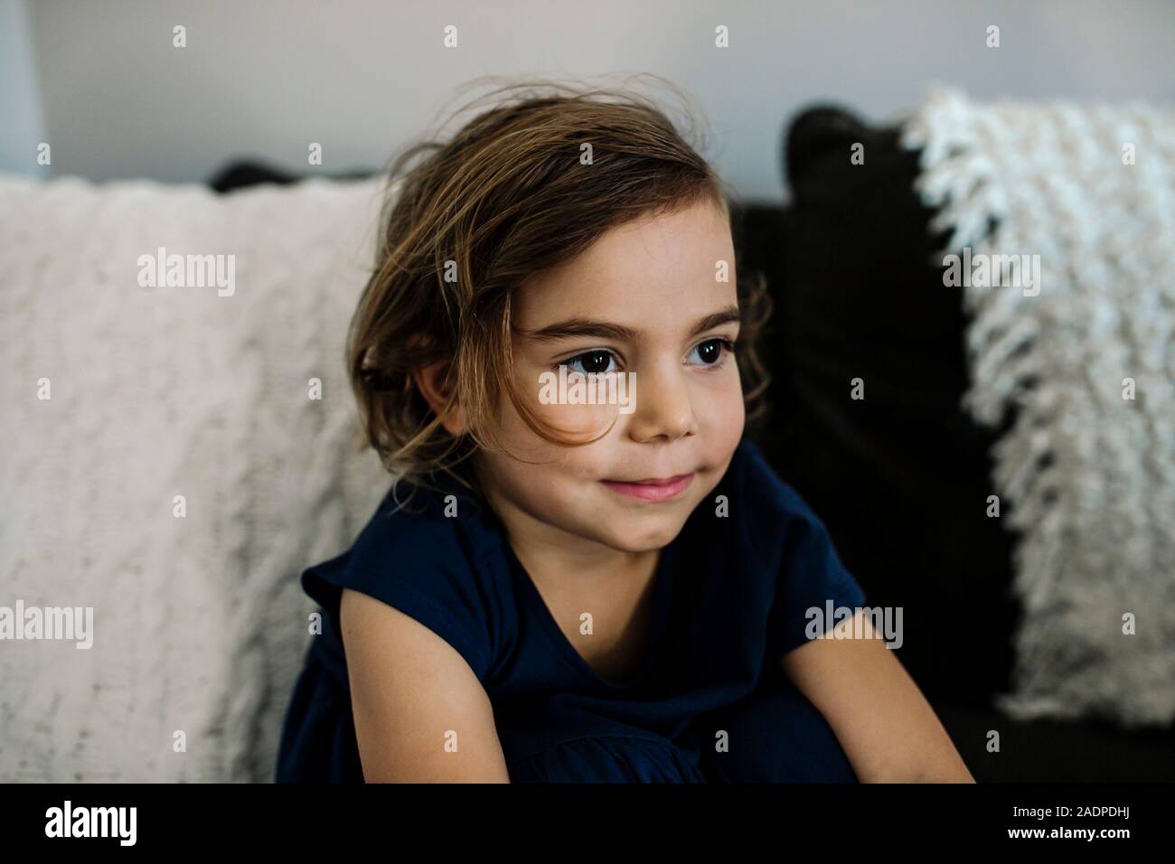 Beautiful young girl with dark hair and big brown eyes Stock Photo