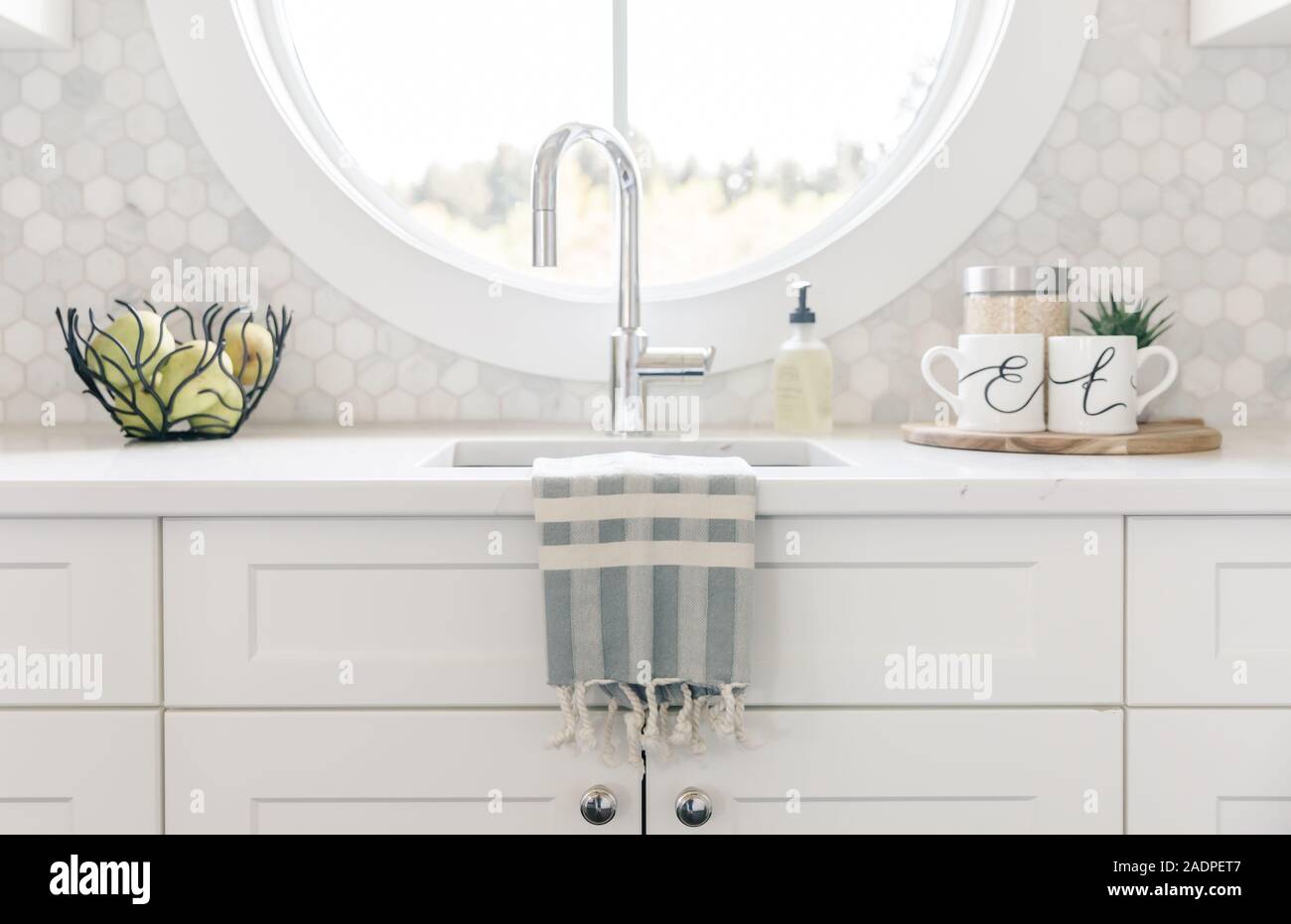 Tea Towel On Sink With Mugs At Morning Butlers Pantry Stock Photo