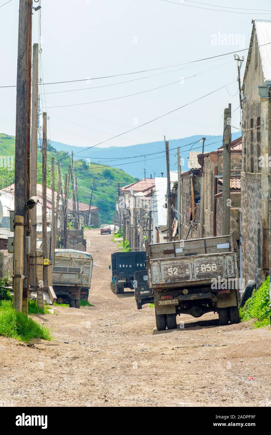 Buildings and dirt road in the village of Shinuhayr, Syunik Province, Armenia Stock Photo