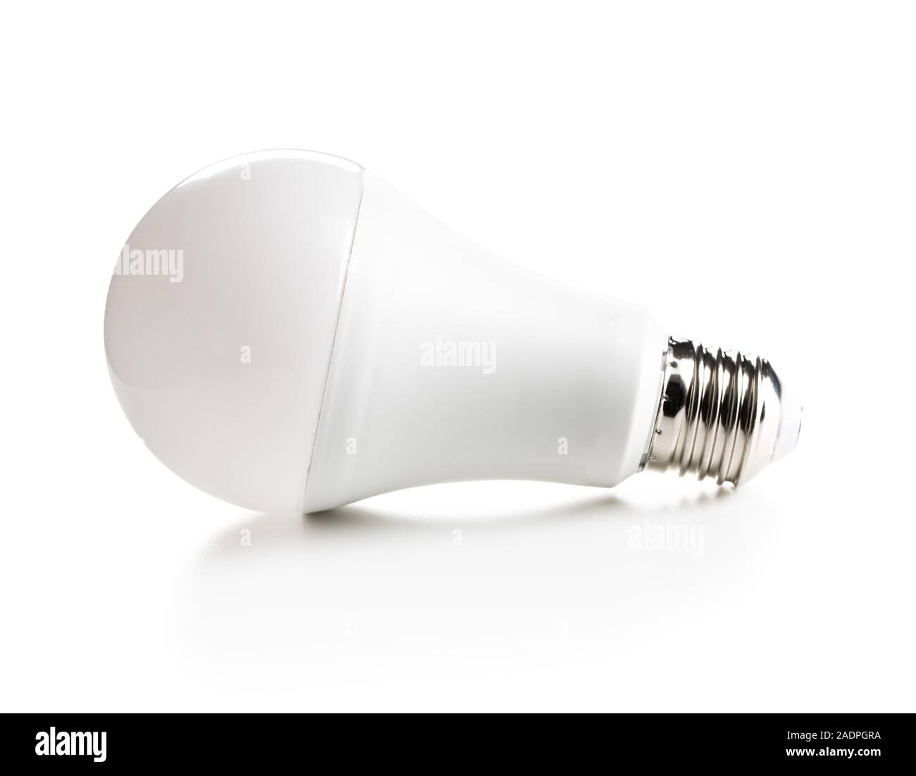 Energy saving light bulb isolated on white table. Led light bulb. Stock Photo