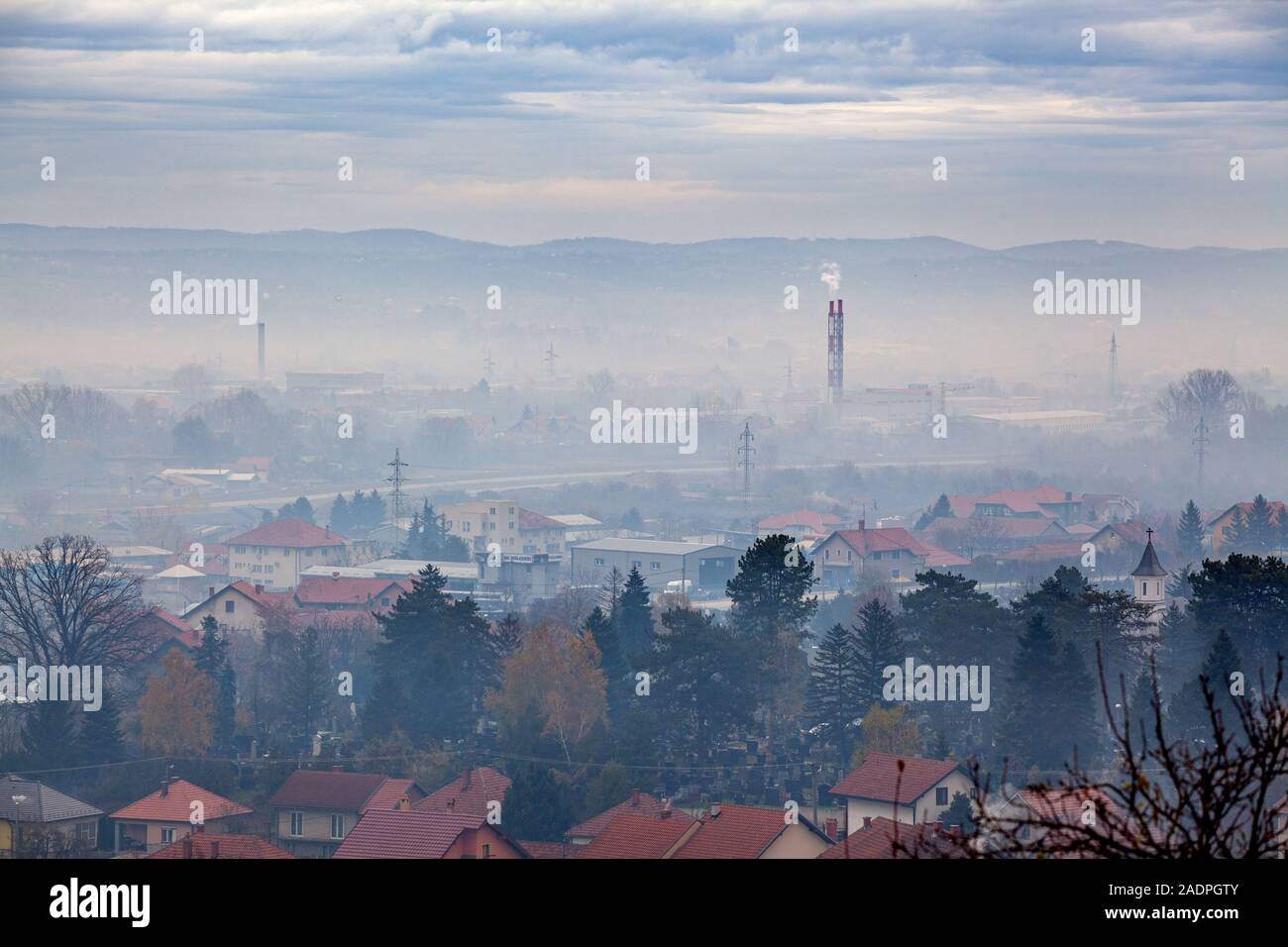Fog, smoke, smog and air pollution, Serbia, Valjevo city, Europe Stock Photo