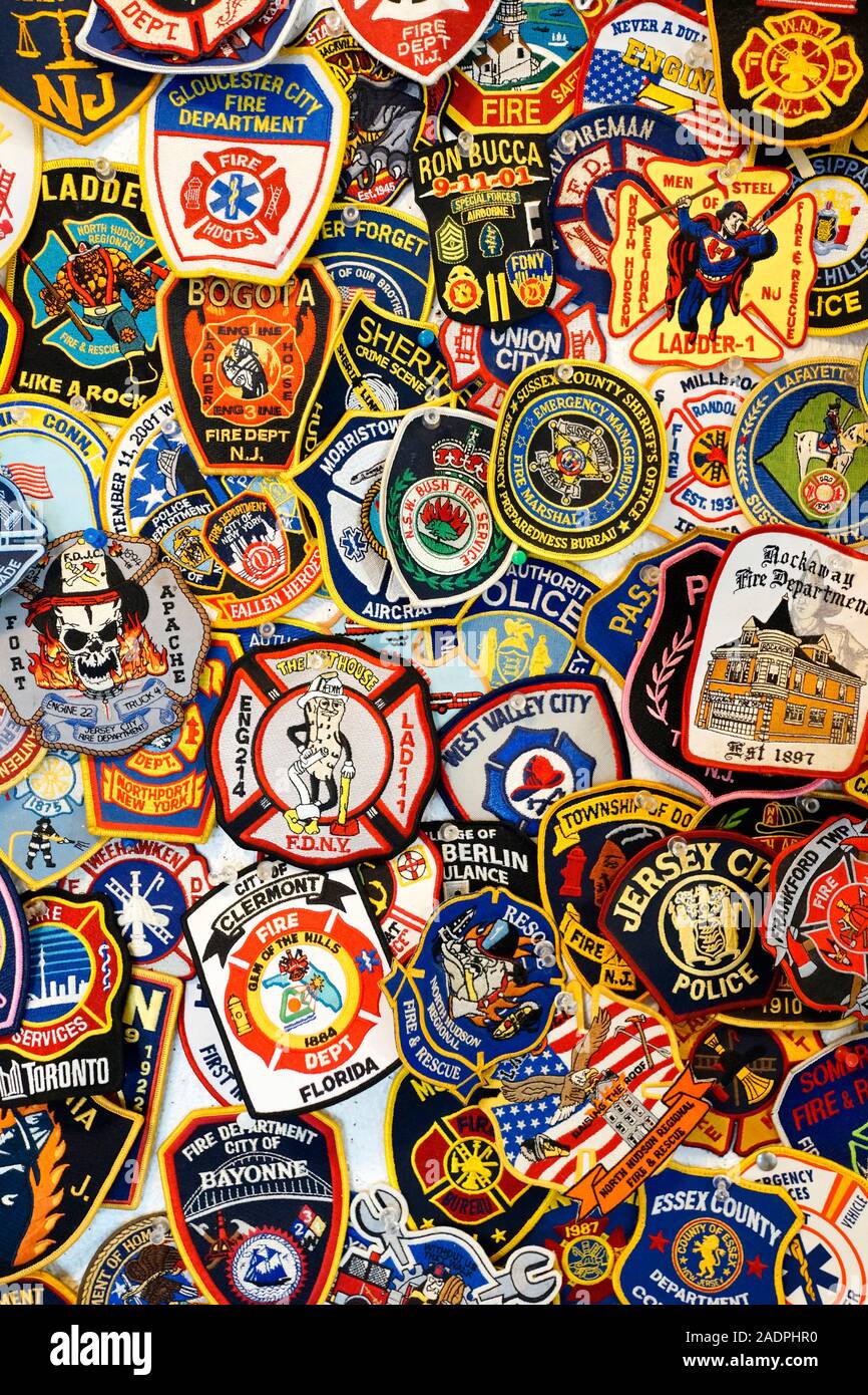 First Responders, Police and Fire Fighters patches.  Group shot of many colorful cloth embroidered patches. Solid, full frame of patches, Stock Photo