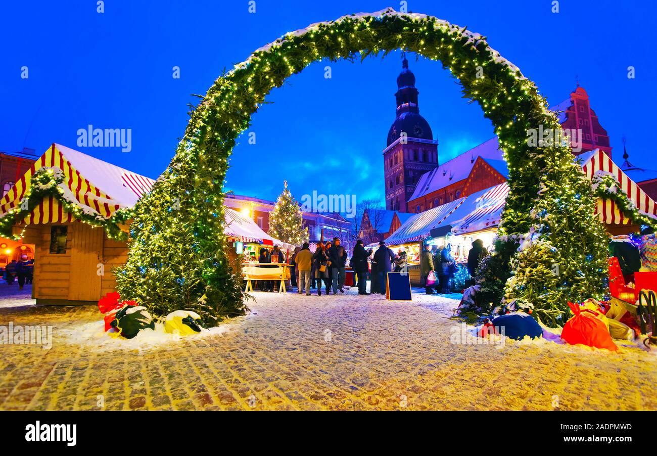 Beautiful entrance to the Christmas Market in Riga reflex Stock Photo ...