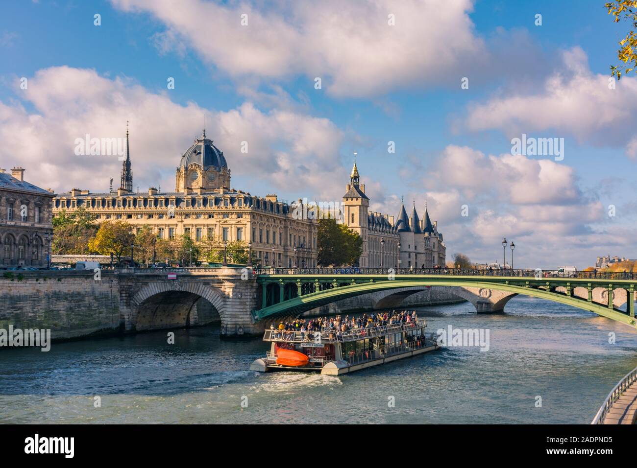 Paris, France - November 7, 2019: Seine river, Notre Dame Bridge, trade court and Palais de la Cite (City Palace) Residence of the kings of France (10 Stock Photo