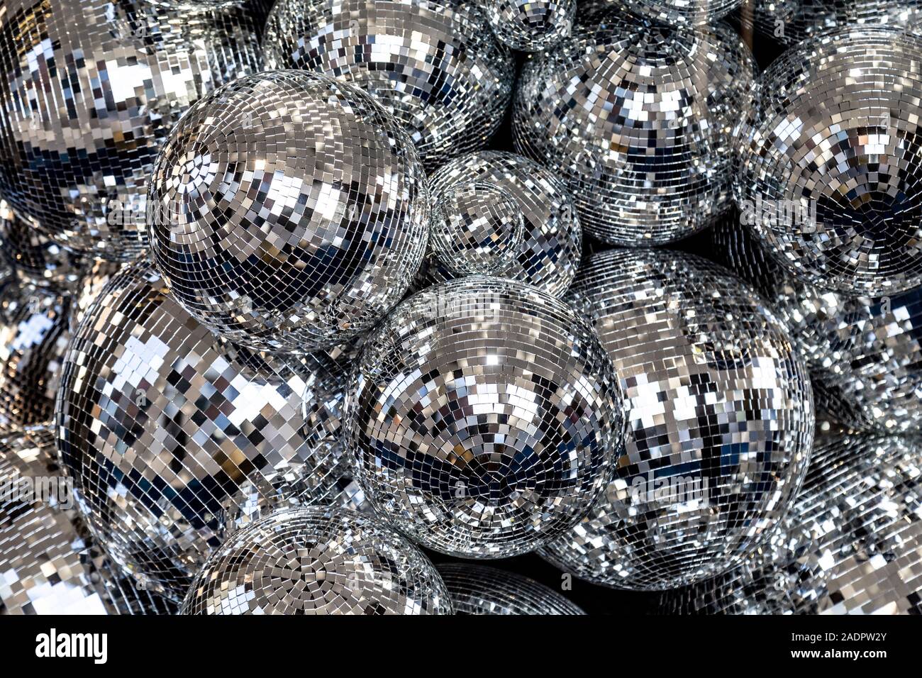 Silver disco balls background Stock Photo - Alamy