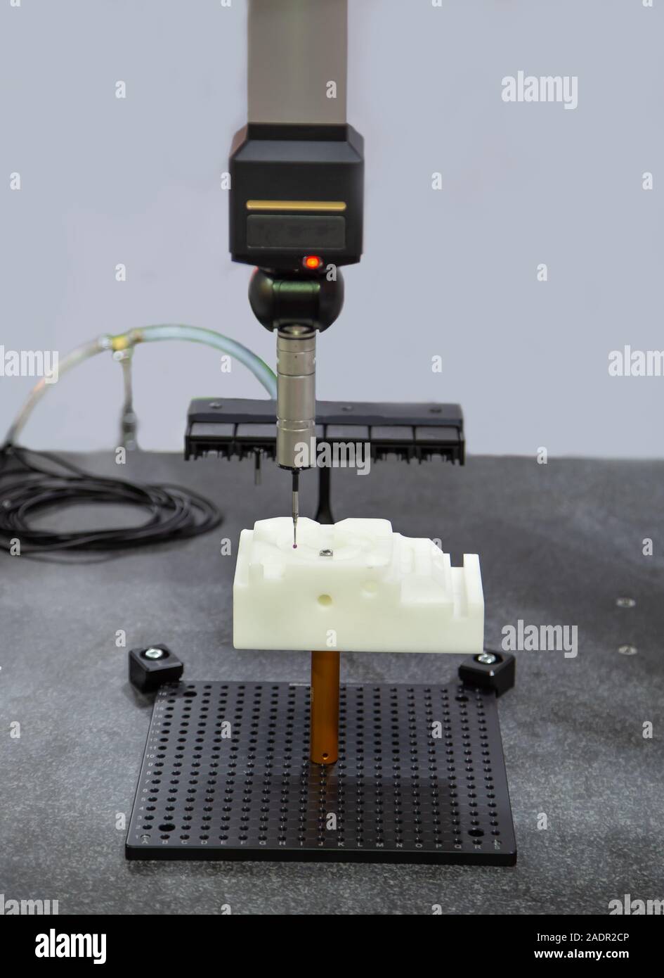 CMM Coordinate Measuring Dimension Machine inspecting sample workpiece