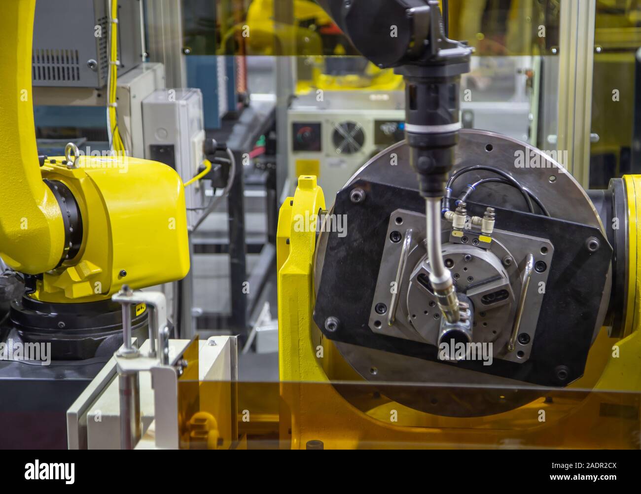 6 axis industry robotic arc machine welding nipple to pipe Stock Photo