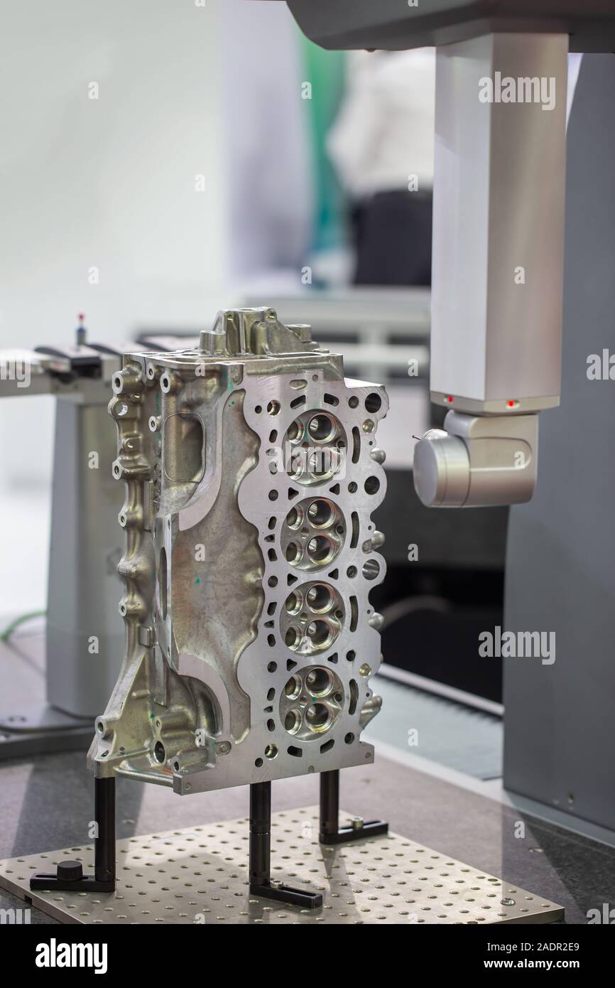 CMM Coordinate Measuring Dimension Machine inspecting engine part Stock