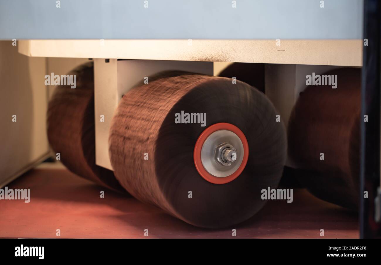 Deburring metal sharp edge and rounding machine Stock Photo Alamy