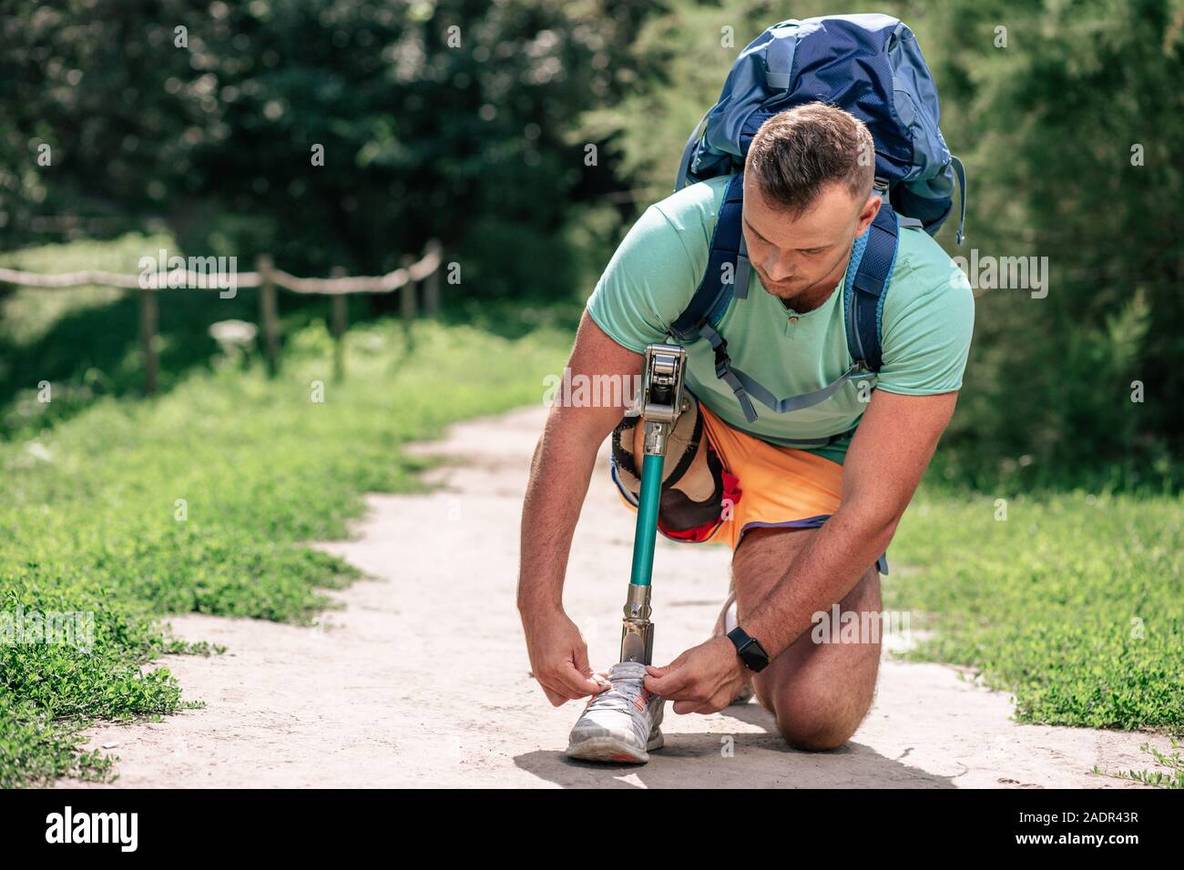 Active young man with prosthesis enjoying activities outdoors Stock Photo