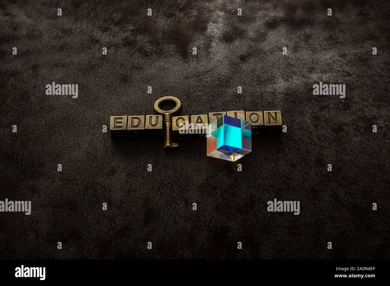 Prism, Love shaped padlock, key and education wording on dark Stock Photo Alamy