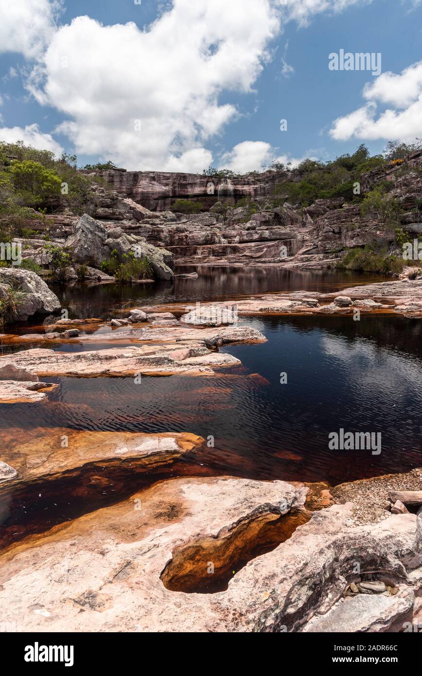 Beautiful natural waterfall on rocky landscape, Chapada Diamantina, Bahia, Brazil Stock Photo