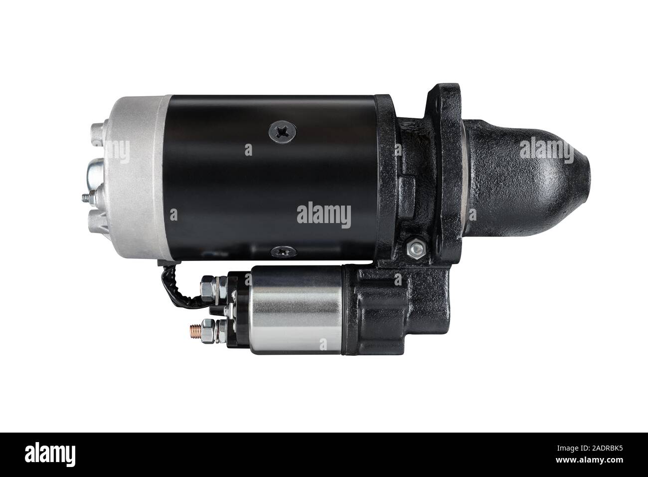 3kW starter motor for tractor or other agricultural machinery placed on white isolated background. Stock Photo
