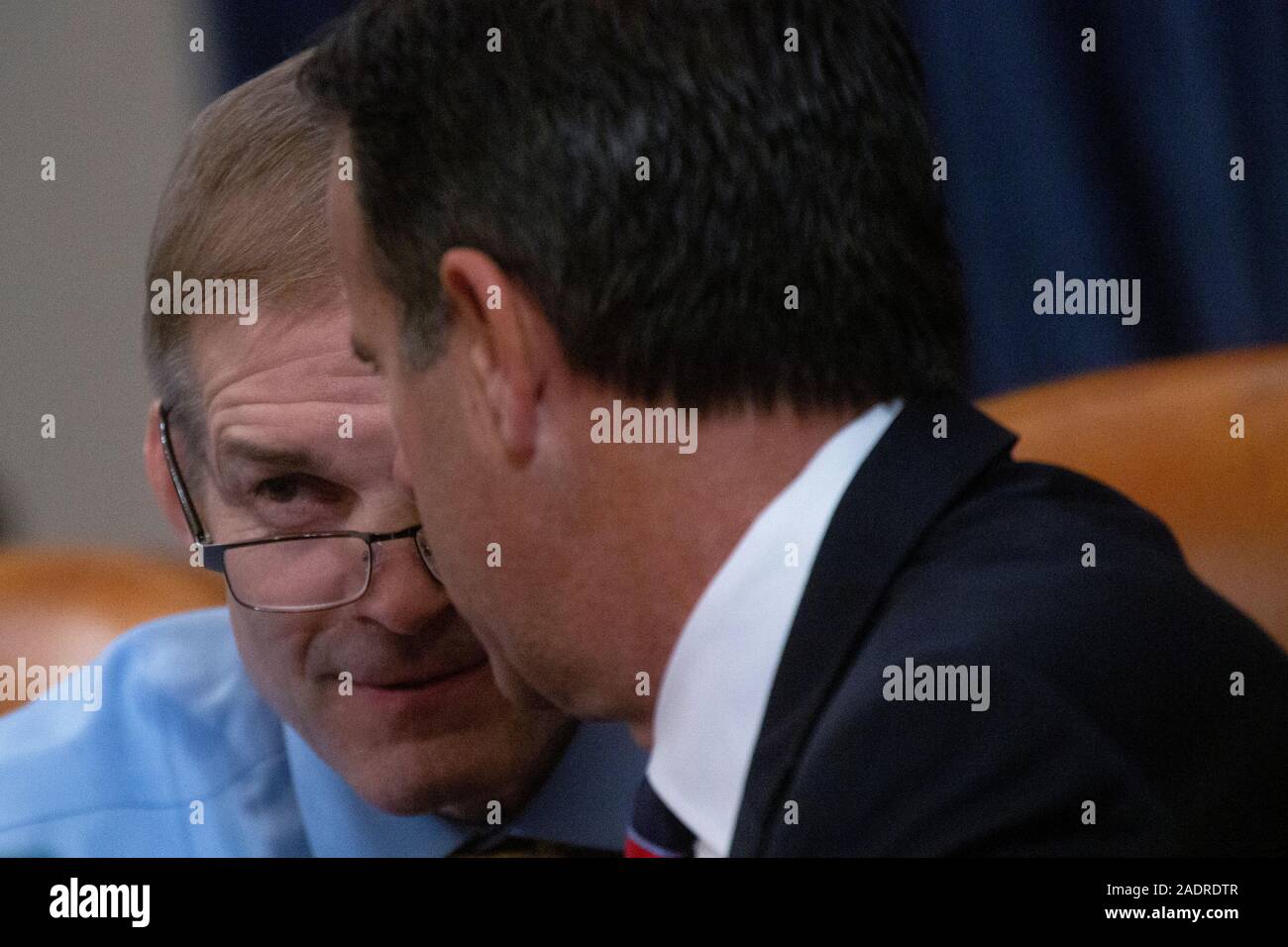 United States Representative Jim Jordan (Republican of Ohio) speaks to United States Representative John Ratcliffe (Republican of Texas) during the United States House Committee on the Judiciary hearing with constitutional law experts Noah Feldman, of Harvard University, Pamela Karlan, of Stanford University, Michael Gerhardt, of the University of North Carolina, and Jonathan Turley of The George Washington University Law School on Capitol Hill in Washington, DC, U.S. on Wednesday, December 4, 2019. Credit: Stefani Reynolds/CNP | usage worldwide Stock Photo