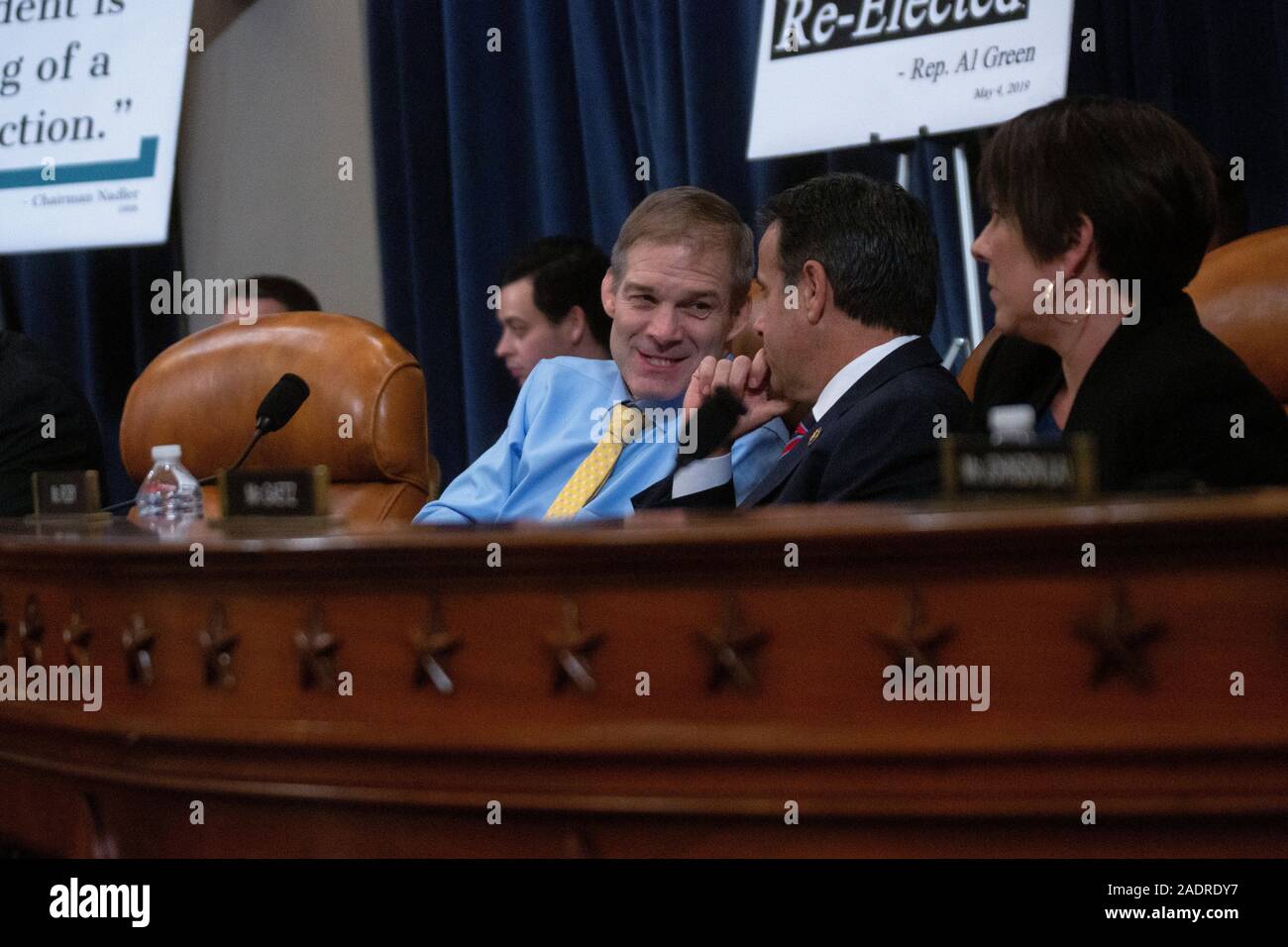 United States Representative Jim Jordan (Republican of Ohio) speaks to United States Representative John Ratcliffe (Republican of Texas) during the United States House Committee on the Judiciary hearing with constitutional law experts Noah Feldman, of Harvard University, Pamela Karlan, of Stanford University, Michael Gerhardt, of the University of North Carolina, and Jonathan Turley of The George Washington University Law School on Capitol Hill in Washington, DC, U.S. on Wednesday, December 4, 2019. Credit: Stefani Reynolds/CNP | usage worldwide Stock Photo