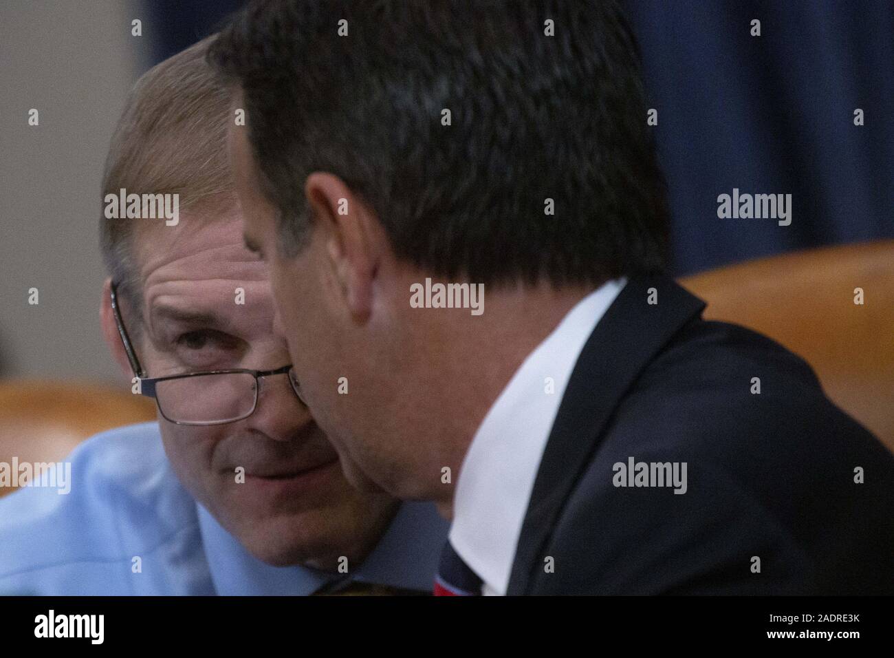 December 4, 2019, Washington, District of Columbia, USA: United States Representative Jim Jordan (Republican of Ohio) speaks to United States Representative John Ratcliffe (Republican of Texas) during the United States House Committee on the Judiciary hearing with constitutional law experts Noah Feldman, of Harvard University, Pamela Karlan, of Stanford University, Michael Gerhardt, of the University of North Carolina, and Jonathan Turley of The George Washington University Law School on Capitol Hill in Washington, DC, U.S. on Wednesday, December 4, 2019. (Credit Image: © Stefani Reynolds/CNP Stock Photo