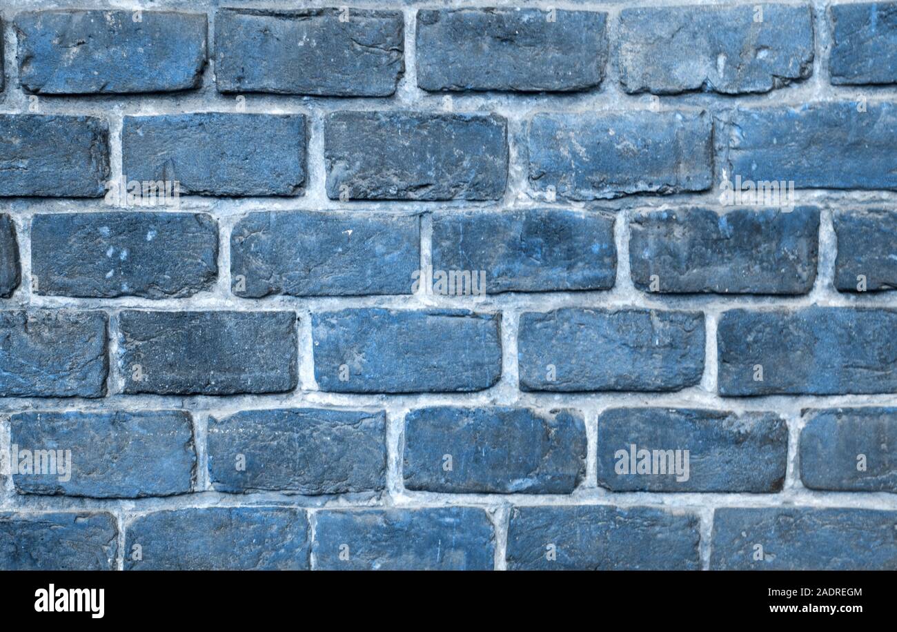 Brick wall texture. Natural pattern stone blue background. 2020 year