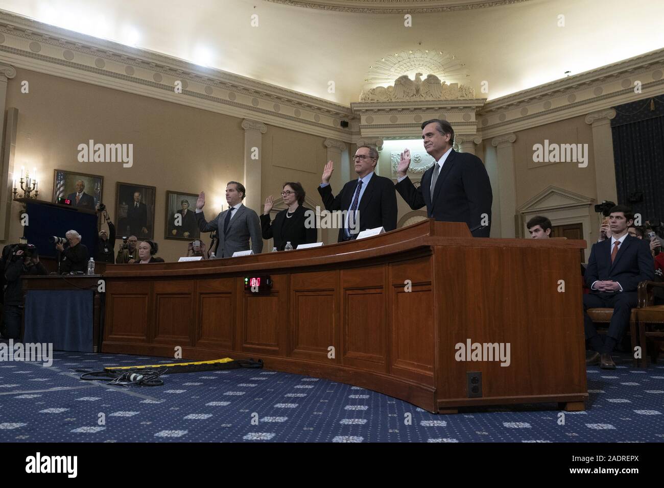 Washington, District of Columbia, USA. 4th Dec, 2019. Constitutional law experts Noah Feldman, of Harvard University, Pamela Karlan, of Stanford University, Michael Gerhardt, of the University of North Carolina, and Jonathan Turley of The George Washington University Law School, are sworn in before the United States House Committee on the Judiciary on Capitol Hill in Washington, DC, U.S. on Wednesday, December 4, 2019. Credit: Stefani Reynolds/CNP/ZUMA Wire/Alamy Live News Stock Photo