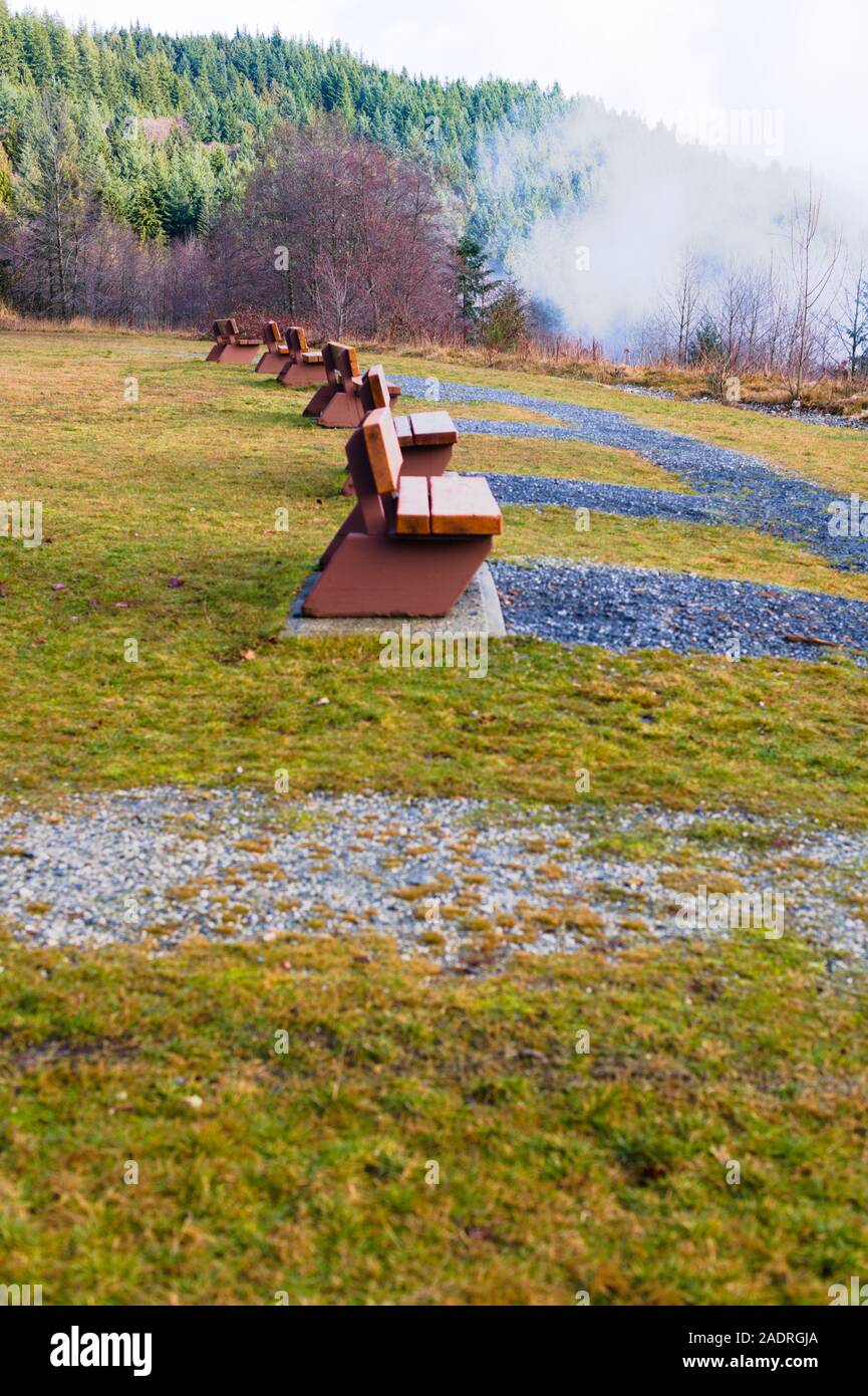 Park benches with a view of downtown Vancouver from Cypress Bowl Provincial Park in West Vancouver, British Columbia, Canada Stock Photo