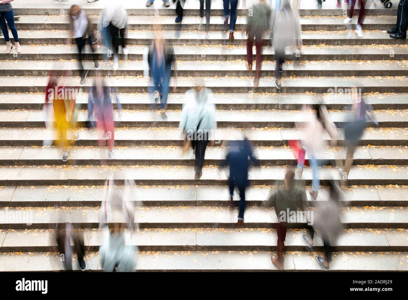 Overhead view of busy crowds of people in motion on the steps to Bethesda Terrace in Central Park, New York City NYC Stock Photo