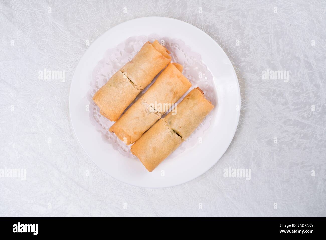 Spring Roll also known as Egg Roll isolated on white Stock Photo - Alamy