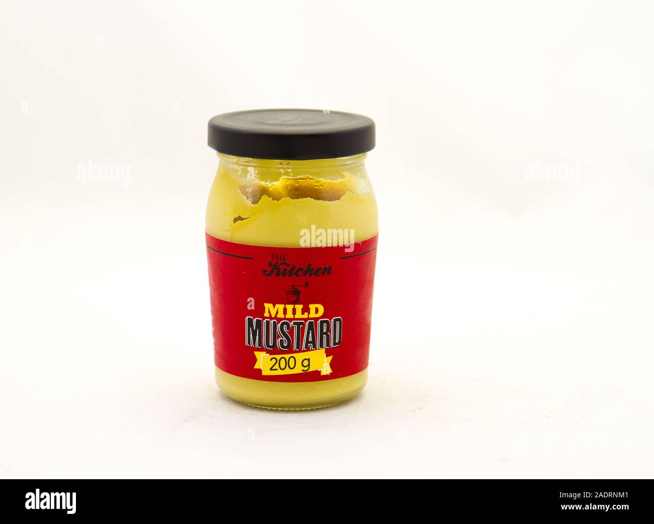 Alberton, South Africa a jar of The Kitchen brand mild mustard isolated on a clear background