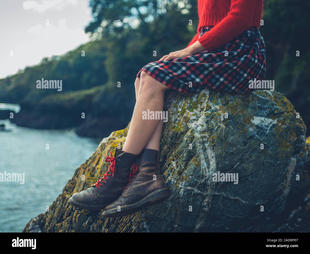 Walking boots woman rocks hi-res stock photography and images - Alamy
