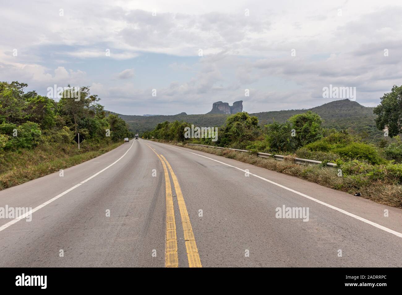 View to express highway on the countryside with big mountain on the back, Chapada Diamantina, Bahia, Brazil Stock Photo