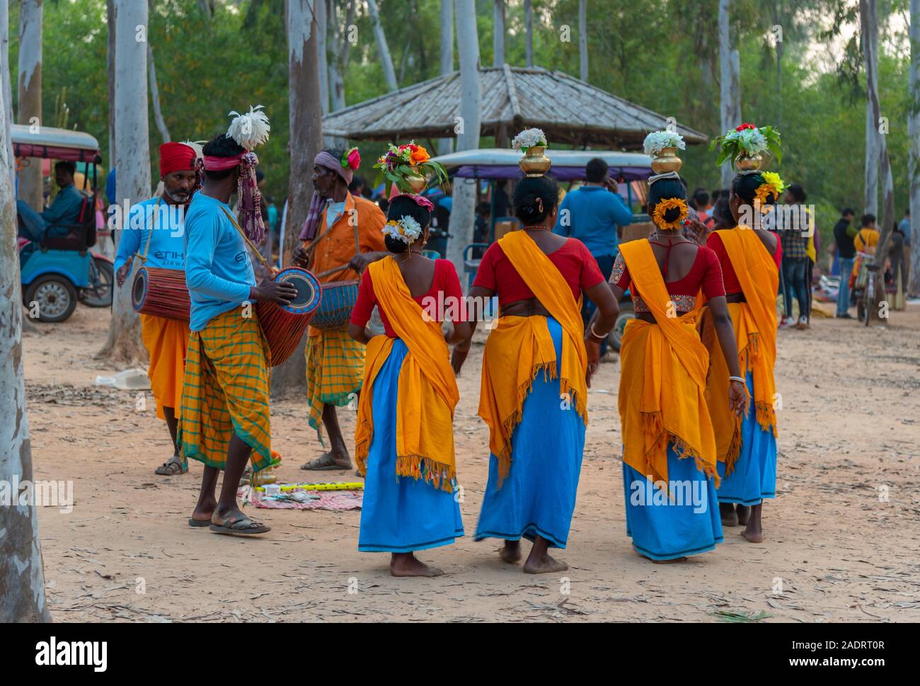 Shantiniketan,West Bengal, India, November 30,2019: Tribal dancers with pitchers on their head dancing at khoai mela/ Sonajhuri haat  bolpur. Stock Photo
