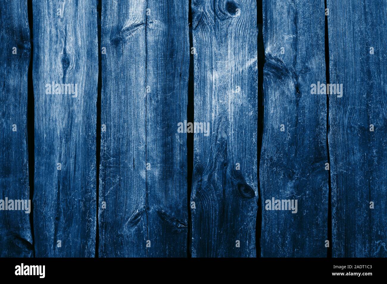 Texture of blue wooden painted planks, old wooden fence. Stock Photo