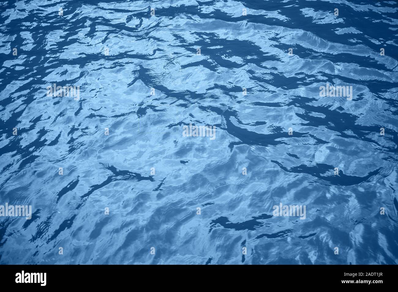 Turquoise blue background of the ocean water Stock Photo - Alamy
