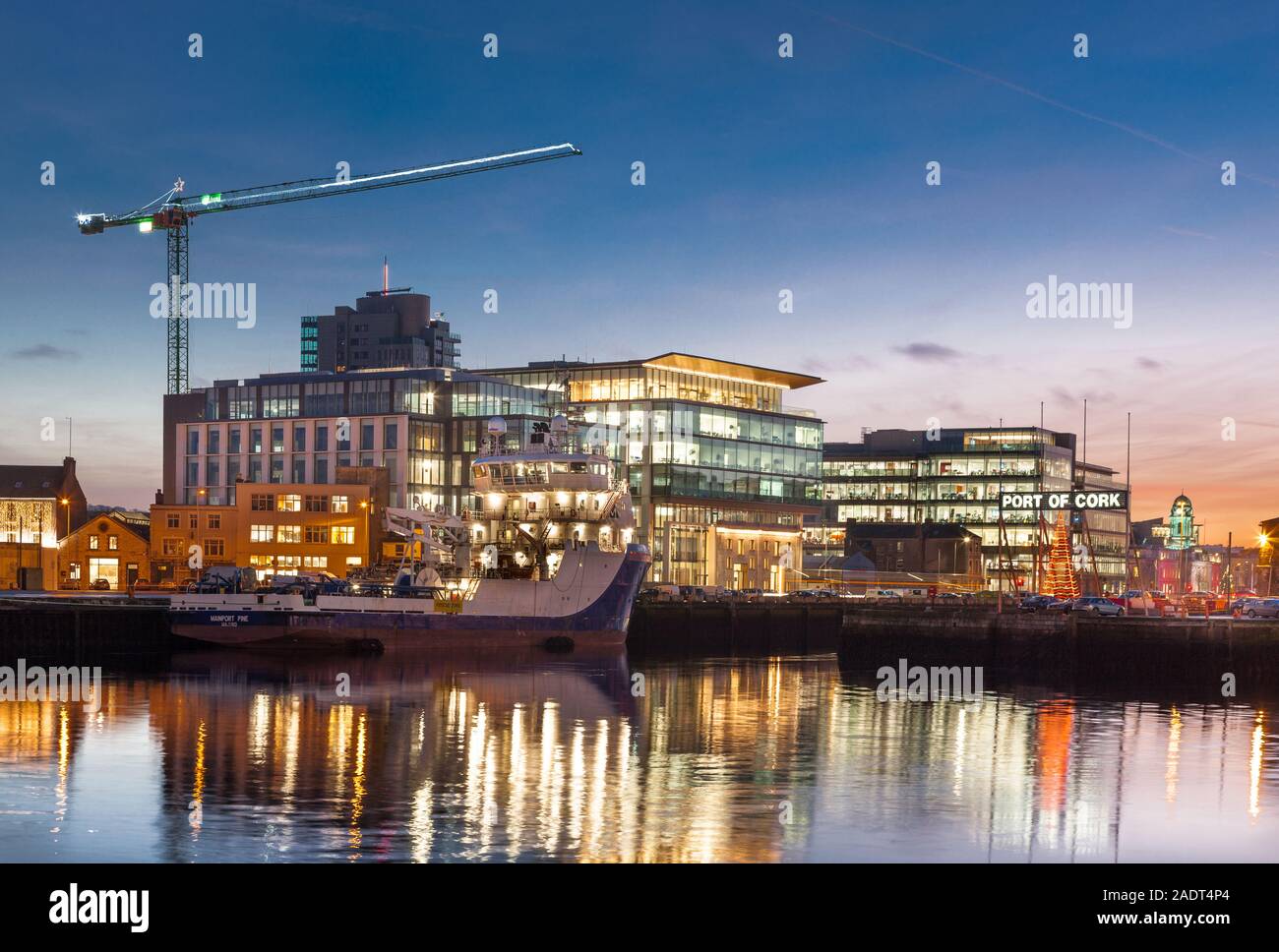 Cork City, Cork, Ireland. 04th December, 2019.  A view of the River Lee with the new Navigation Square building and One Albert Quay after sunset on a winters day in Cork City, Ireland. - Credit; David Creedon / Alamy Live News Stock Photo