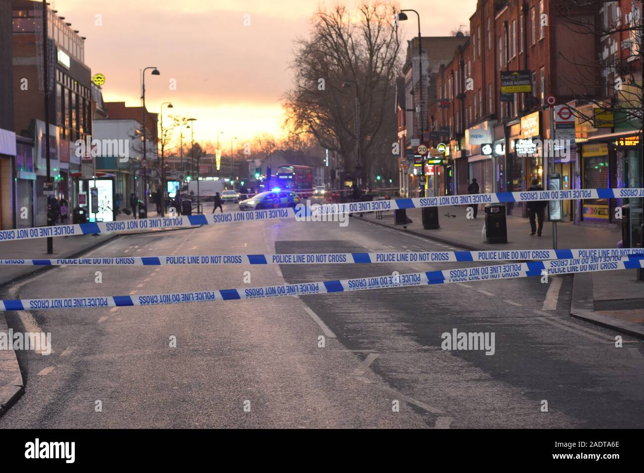 A shooting took place on Woodgreen High street late last night. One male was hit during the shooting and was rushed to a North London hospital in the early hours of the morning said to be in a life threatening condition. The victim was managed to move across the road after being shot to safety where help could soon arrive to assist. Due to this move from one side of the street to the other the whole road had to be closed and traffic redirected as the majority of Woodgreen High Street taped off to in order to preserve the crime scene. Stock Photo