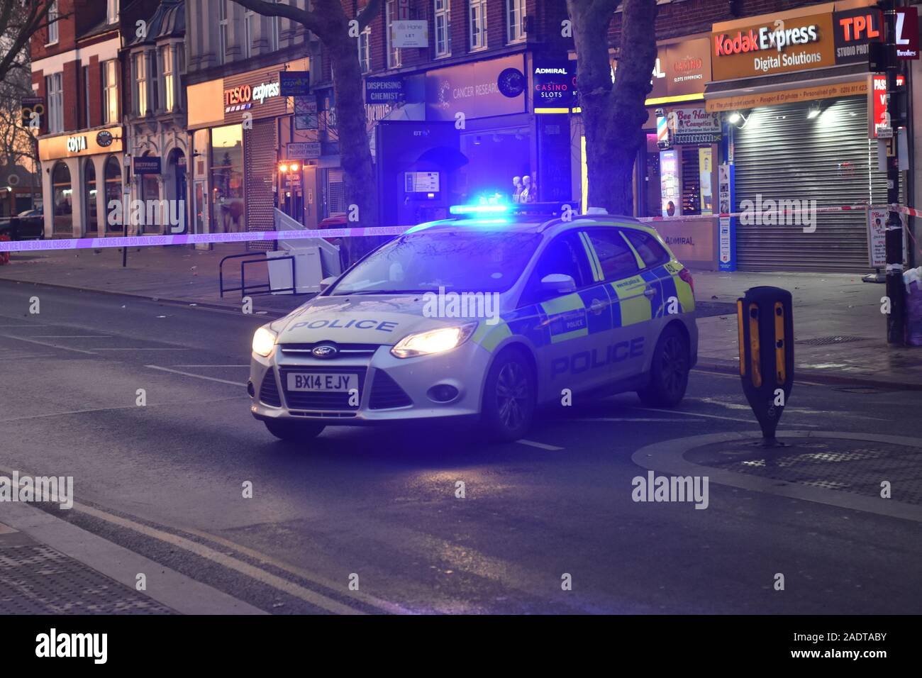 A shooting took place on Woodgreen High street late last night. One male was hit during the shooting and was rushed to a North London hospital in the early hours of the morning said to be in a life threatening condition. The victim was managed to move across the road after being shot to safety where help could soon arrive to assist. Due to this move from one side of the street to the other the whole road had to be closed and traffic redirected as the majority of Woodgreen High Street taped off to in order to preserve the crime scene. Stock Photo