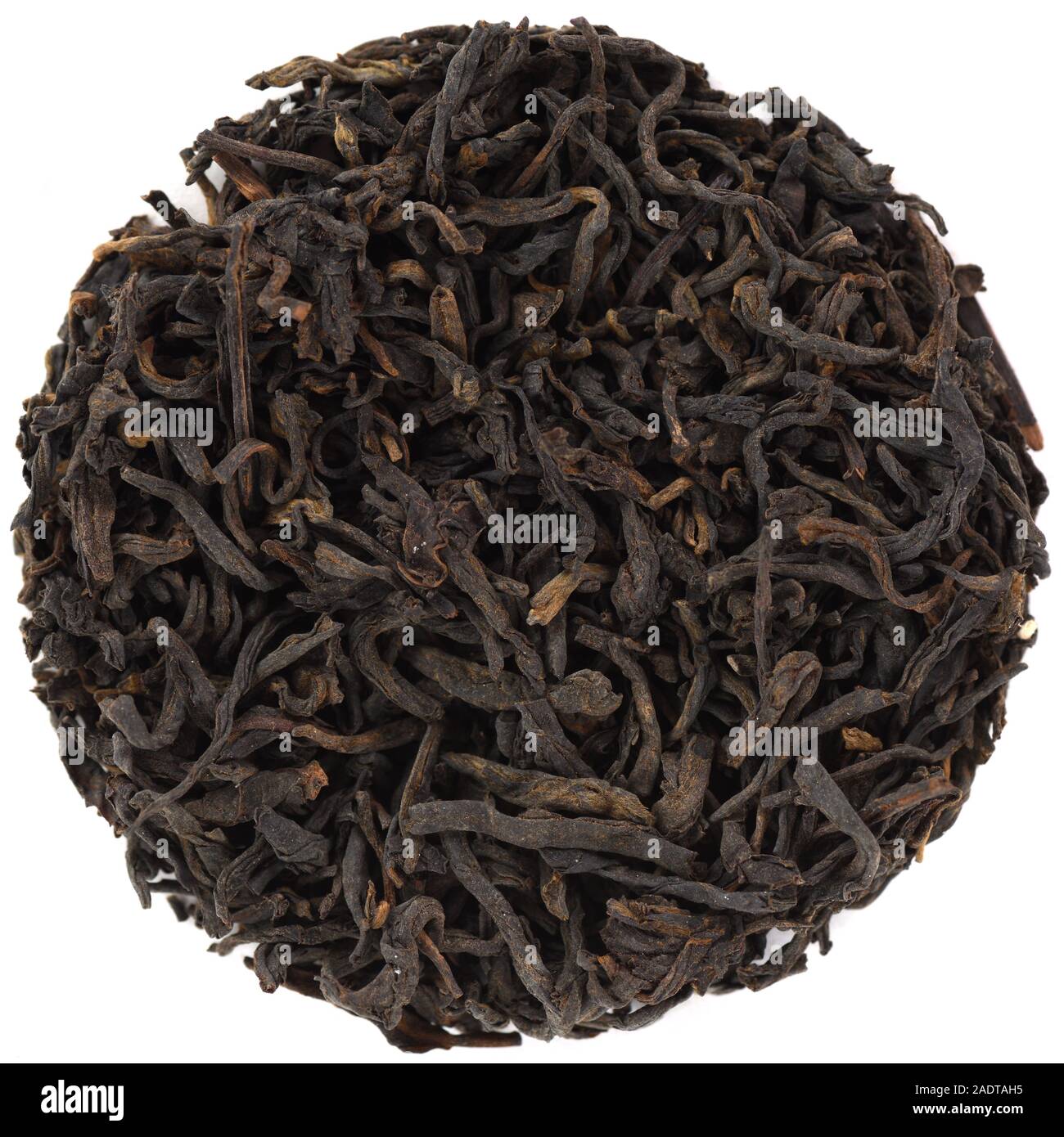 Traditional liubao heacha dark tea from Guanxi in round shape isolated above view Stock Photo