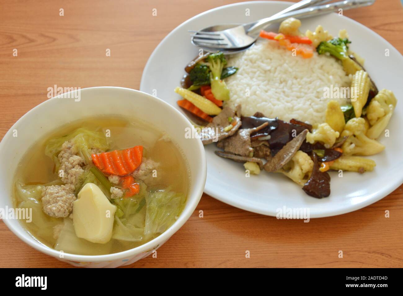 stir fried mixed vegetable with pork liver and egg tofu soup Stock Photo