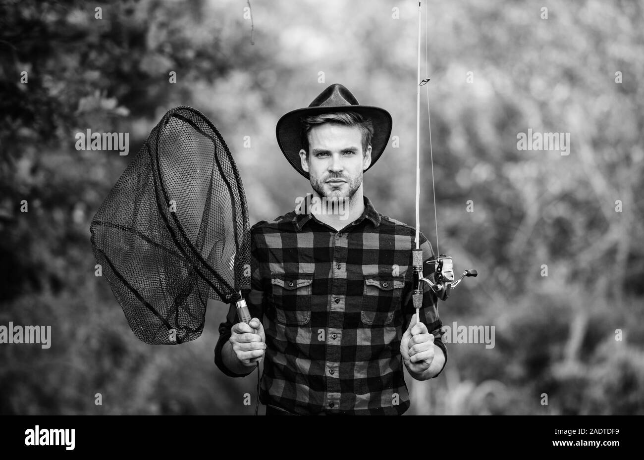 Man casting bait fishing net Black and White Stock Photos & Images - Alamy